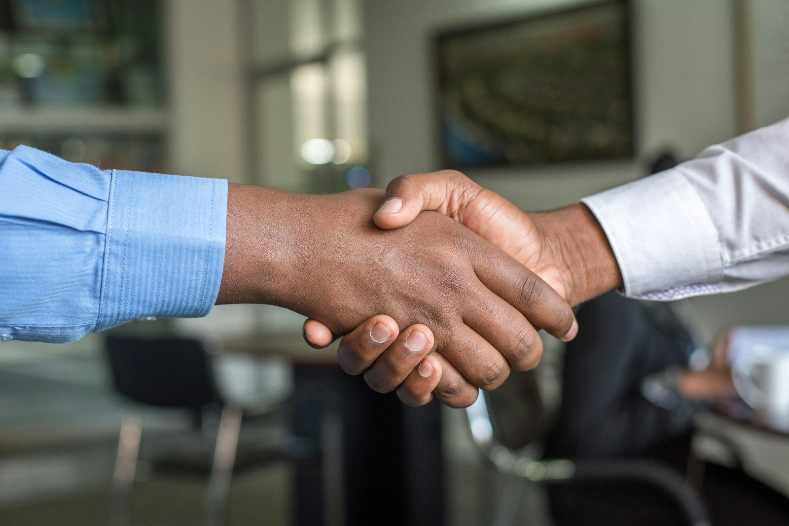 New business partners shaking hands